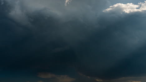 dramatic timelapse of natures sky with black moving clouds in 4k