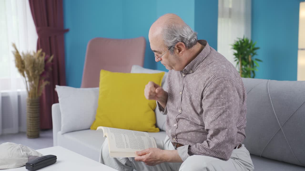 The old man who can't read the book because of coughing.