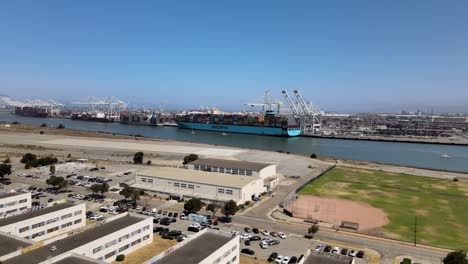 Drone-footage-showcases-a-Maersk-cargo-ship-docked-at-the-Oakland-Estuary