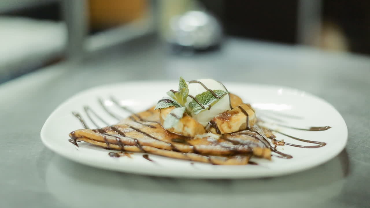 Delicacy In The Hands Of The Chief. Chief cook holding plate with delicacy