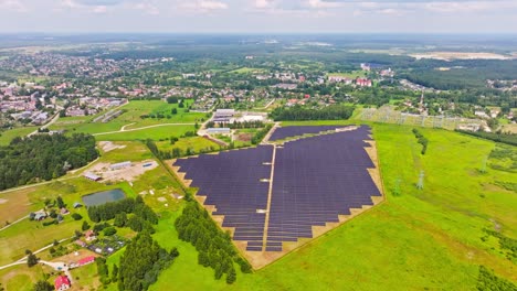 expansive solar grid rotates slowly in focus, backed by fields and salaspils