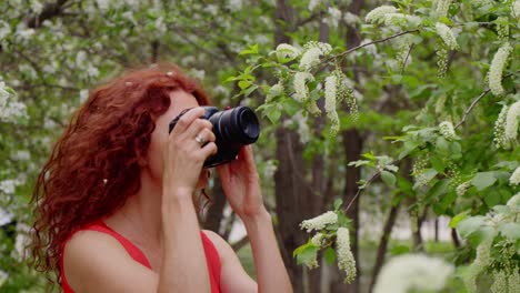 woman in blooming spring garden
