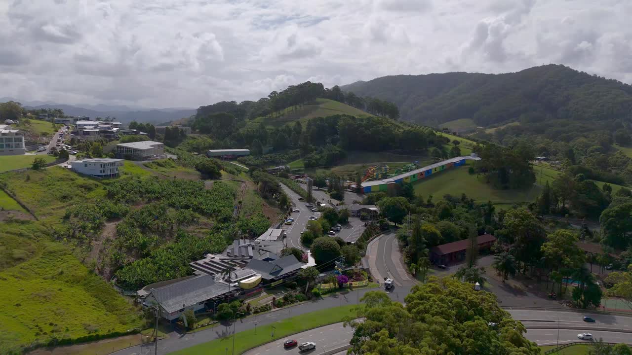 Aerial shot of The Big Banana Fun Park, showcasing its colorful slides and scenic surroundings