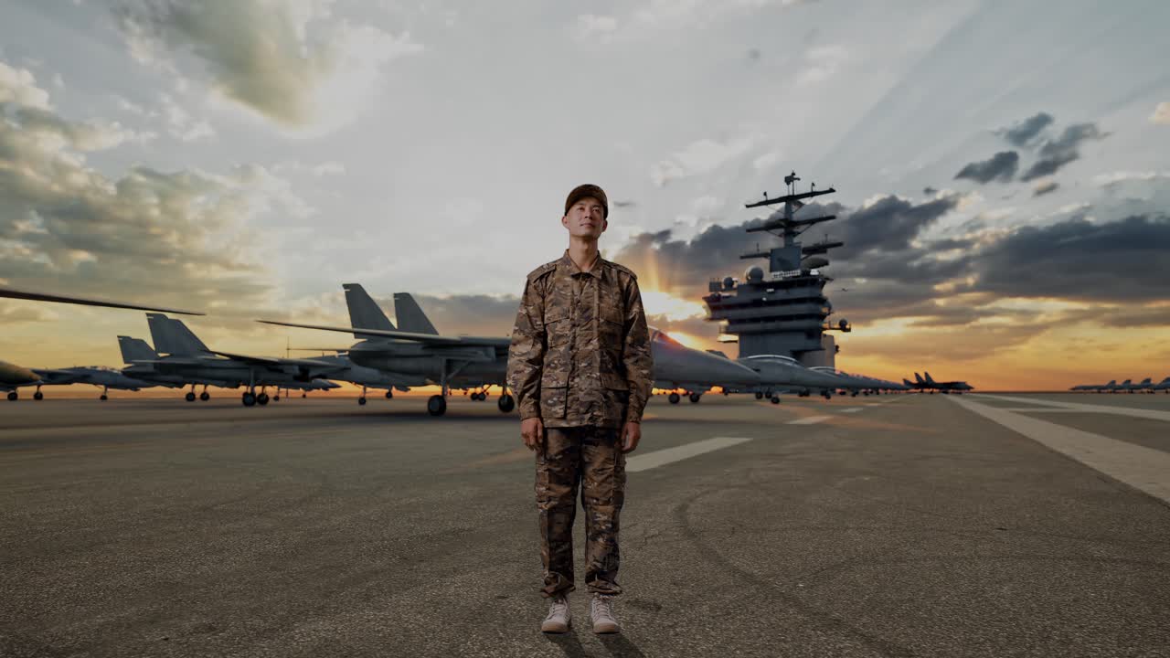 Full Body Of Asian Man Soldier Looking Around While Standing On Aircraft Carrier