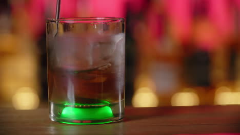 mixing a cocktail at a bar