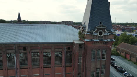 180-Circular-Aerial-of-Abandoned-Building-With-Clock-Tower-in-Ghent