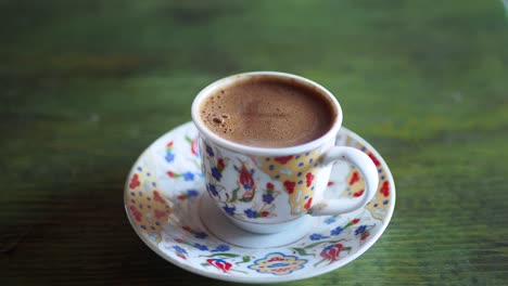 a closeup of a cup of turkish coffee