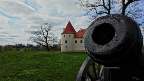 Old-cannon-medieval-defense-system-cast-iron,-Bauska-Castle-Latvia