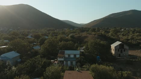 aerial view of a peaceful village nestled in the mountains