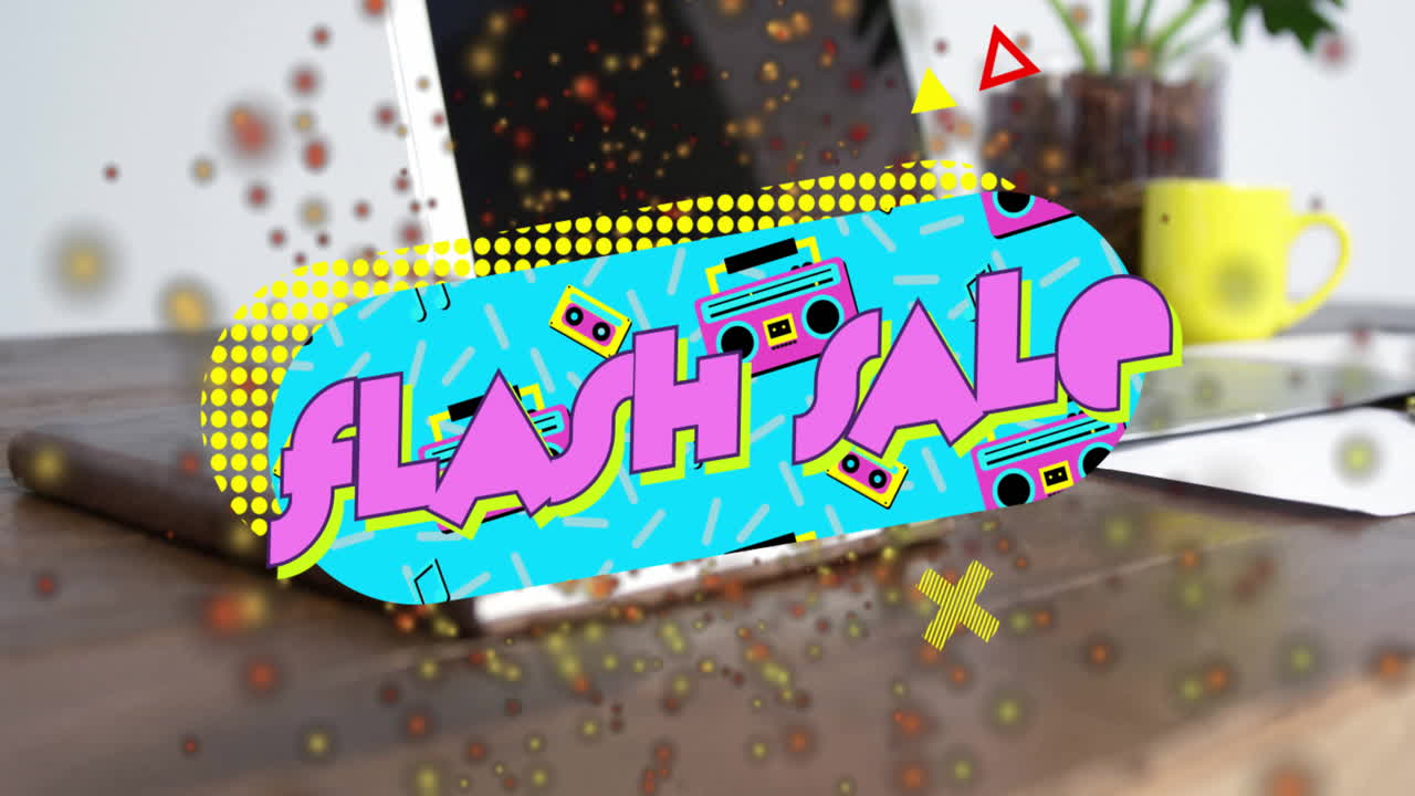 Retro-style flash sale graphic popping up on desktop next to laptop and yellow mug with confetti