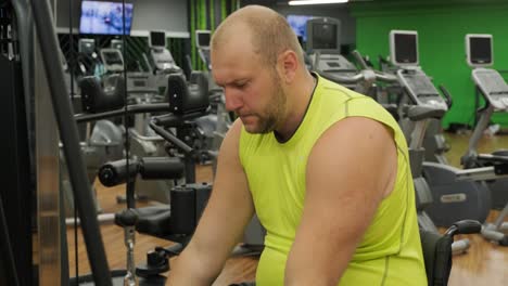 man with disabilities training in the gym of rehabilitation center