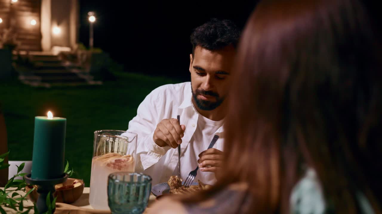 People having dinner at night