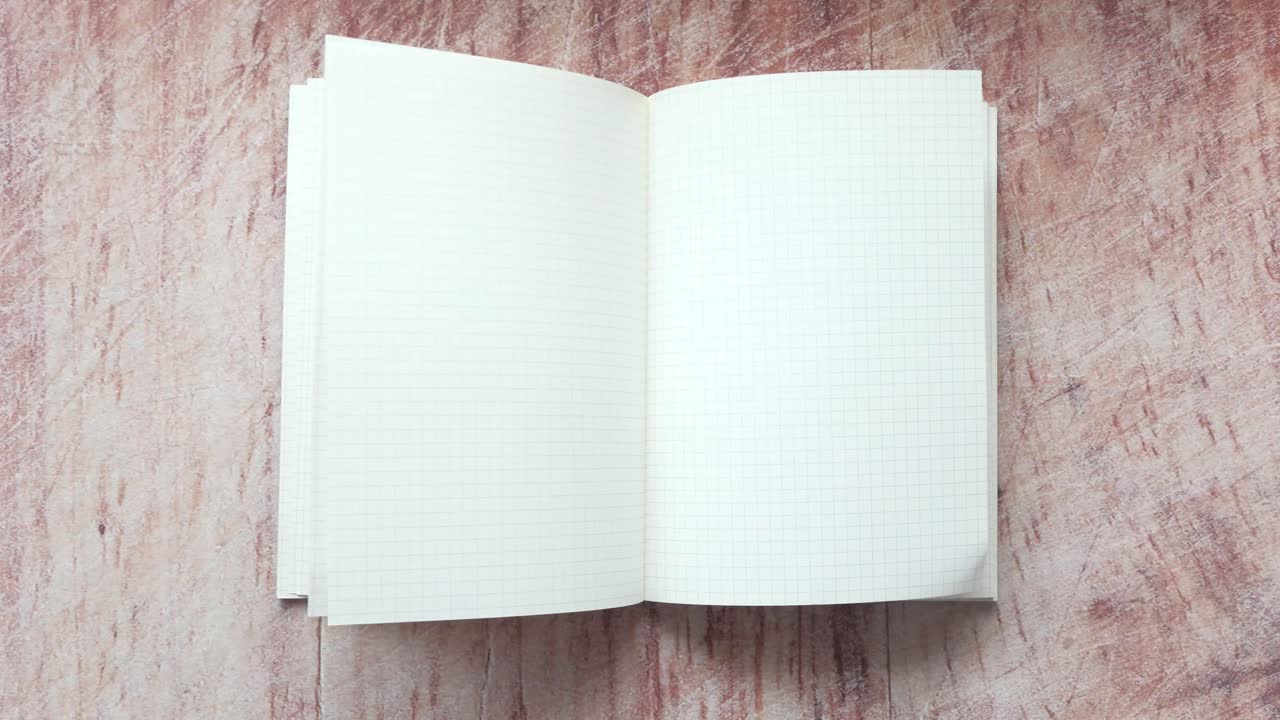 Open Notebook with Grid Paper