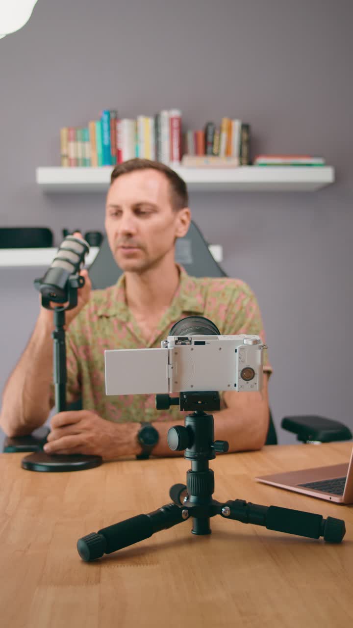 Man Recording a Video Podcast or Blog