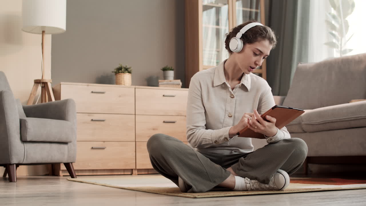 Female Caucasian Adult Using Tablet Computer
