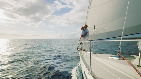 couple sailing into the sunset