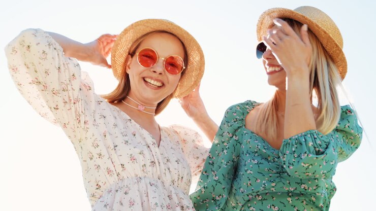 Two happy friends enjoying summer