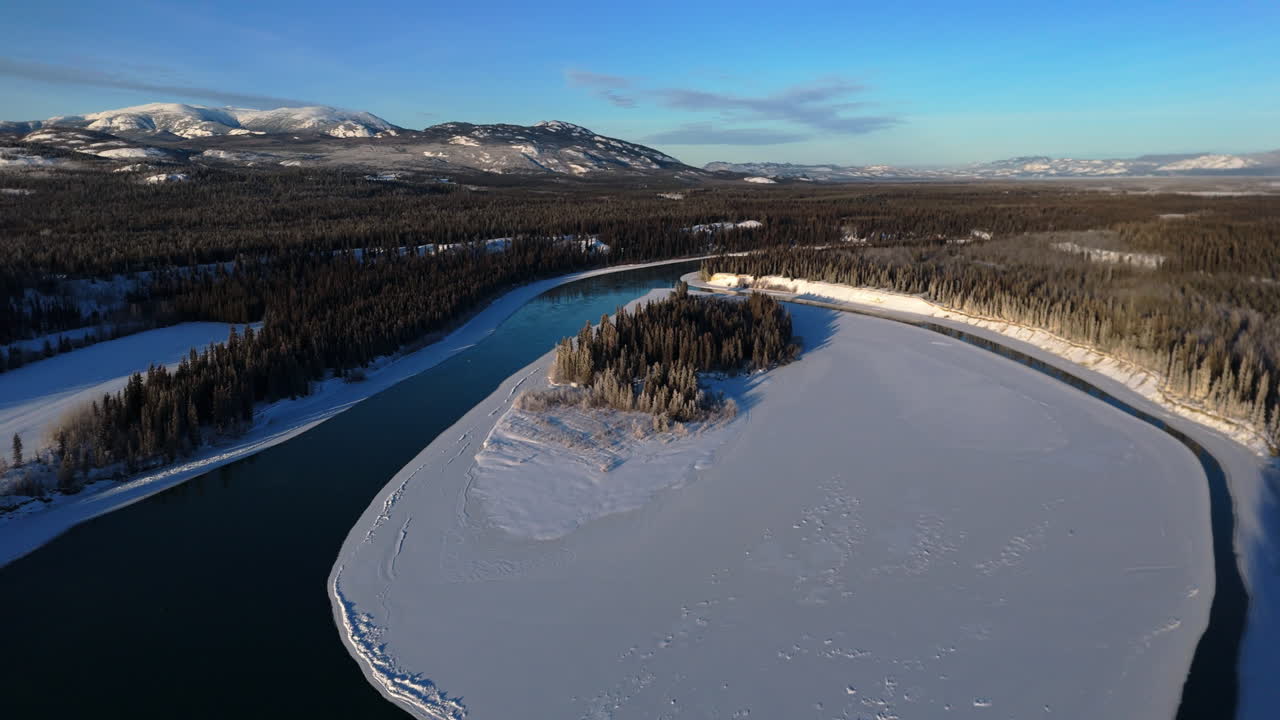 Laberge Lake During Winter In Yukon, Canada - Aerial Shot