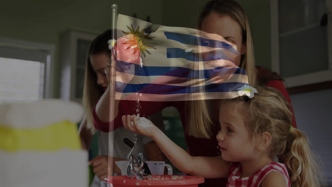 Uruguay flag animation over mother and daughter baking together in kitchen