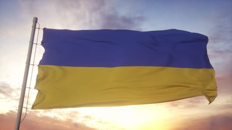ukraine flag waving in the wind, sky and sun background