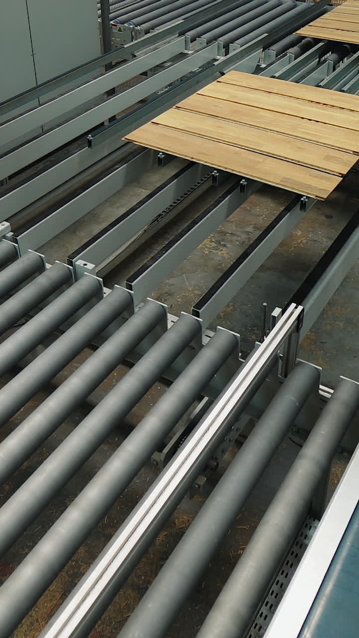 parquet board are processed on the production line in the woodworking plant. Modern production technologies. Vertical video