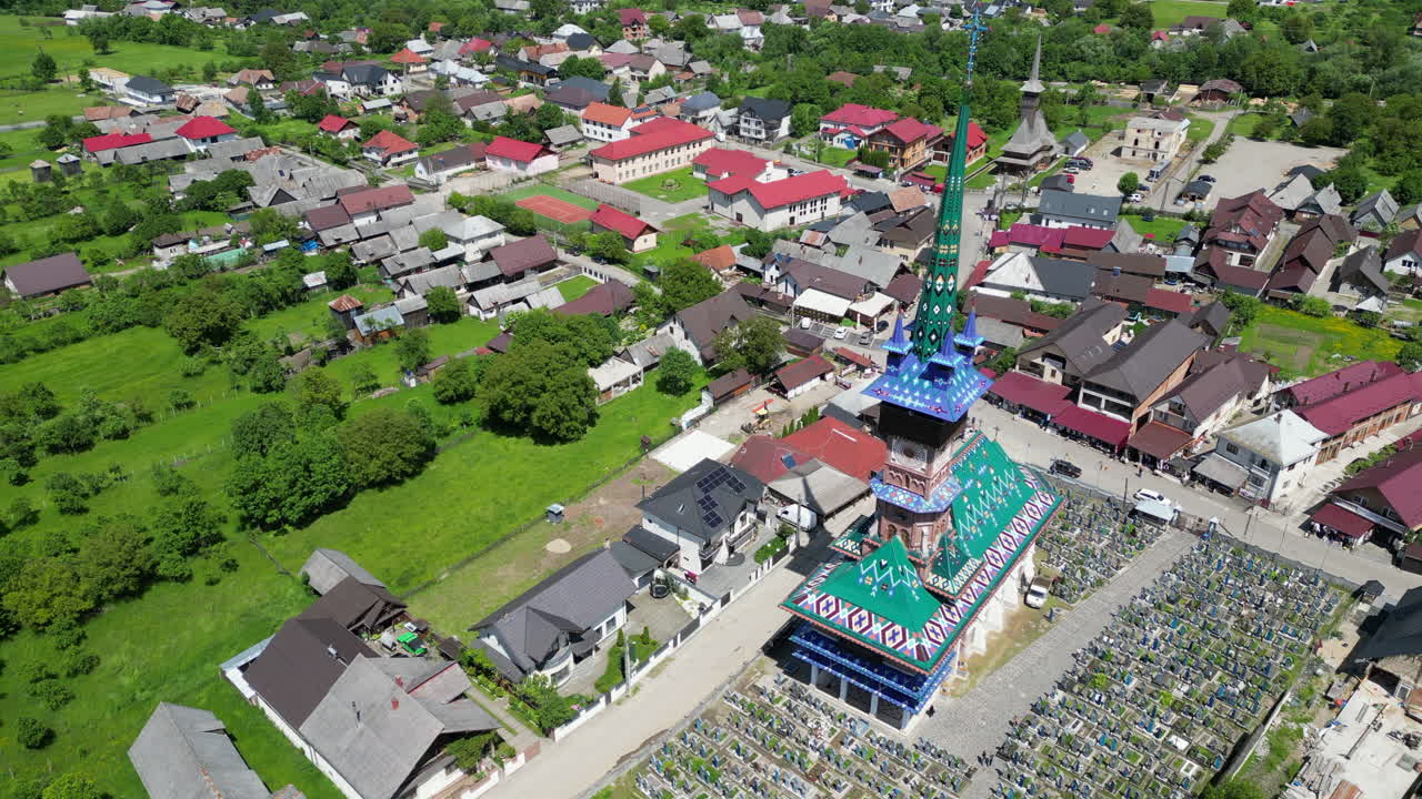 Aerial view of the Merry Cemetery in Sapanta, Romania, a unique cemetery known for its colorful tombstones