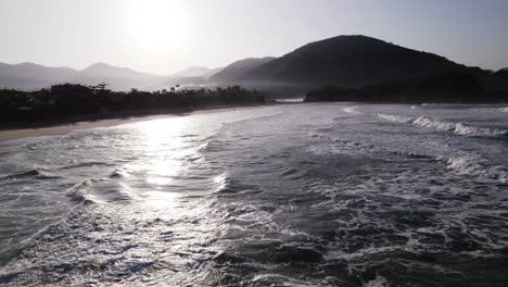 Static-drone-over-the-sea-showing-the-shore-in-the-morning