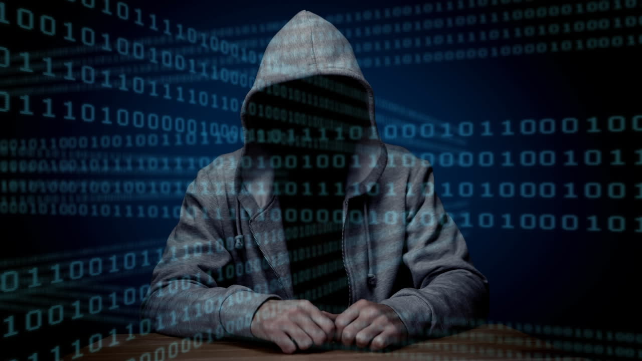 animación digital de hacker sentado en la mesa 4k