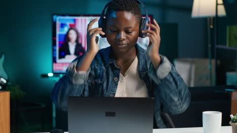 woman working on laptop at night