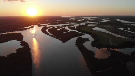 aerial view of a river at sunset