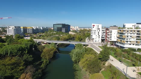 river le lez modern district montpellier port marianne, town hall in background.