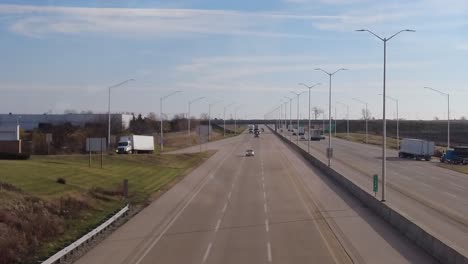 cars driving by on a highway