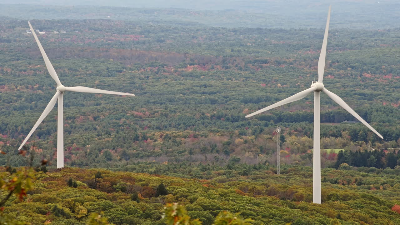 Two windmills spining from the wind