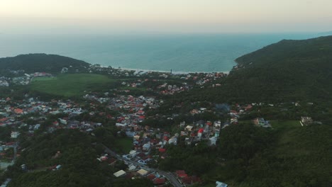 Experience-the-serene-beauty-of-Lagoinha-do-Norte-Beach-at-sunset-in-Florianopolis,-Brazil