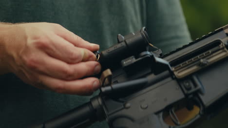 adjusting the optics on a rifle