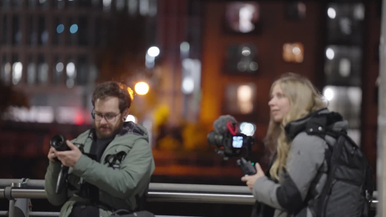 Freelance film crew, location shoot, behind the scenes, urban backdrop ...