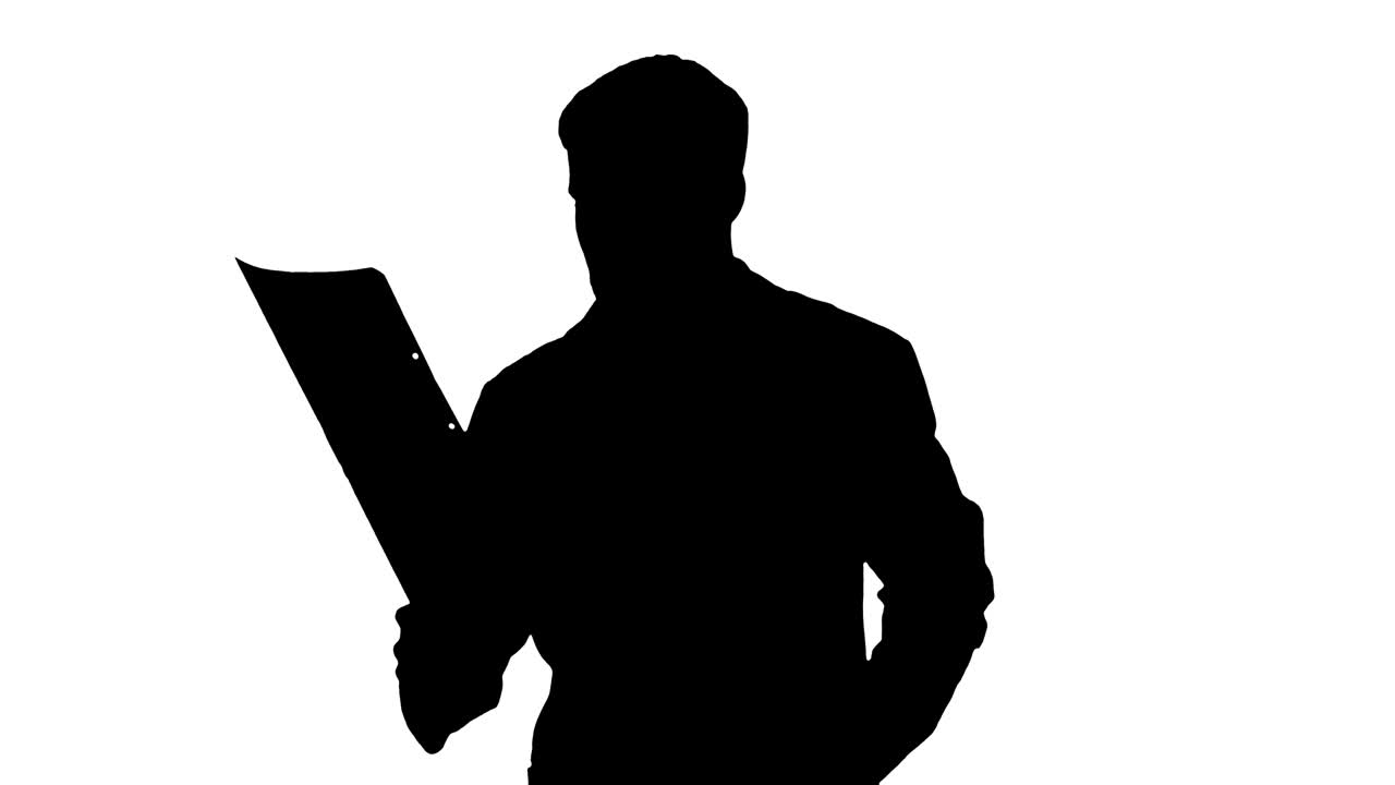 Doctor from middle east walking and looking at ct scan, Alpha Channel