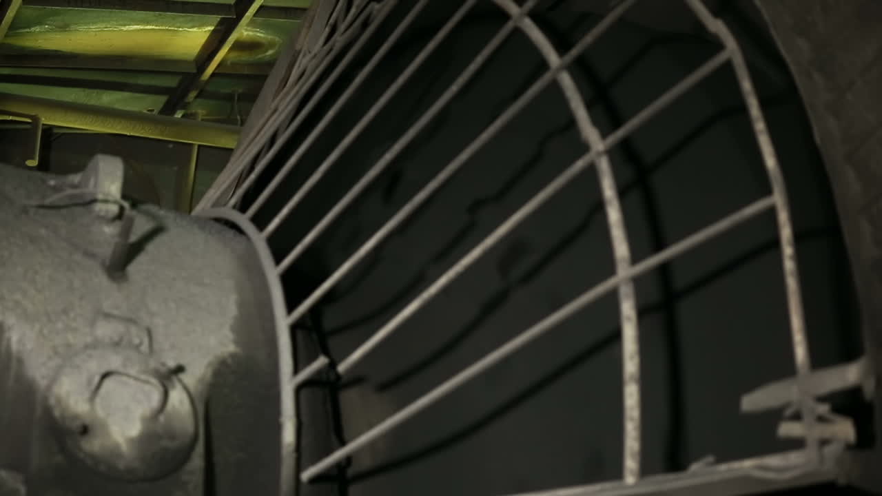 Turbine of thermal power plant. Powerful turbine in the steam turbine hall of power plant