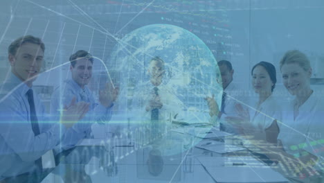 applauding business team with digital globe and data animation in office setting