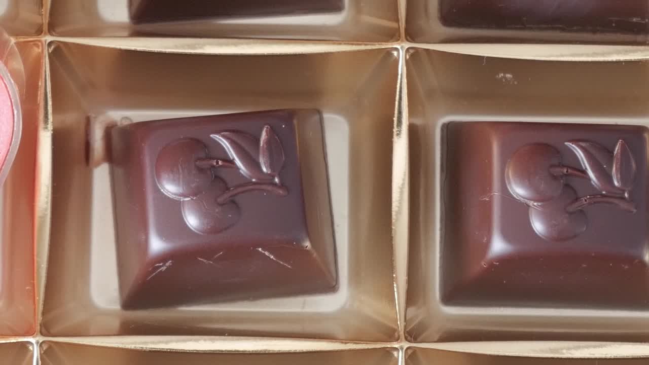Handmade chocolate pieces with heart-shaped design, perfect for Valentine's Day gifts