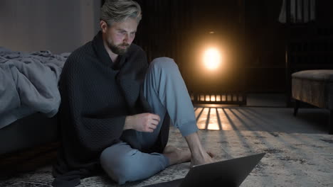 man sitting on the floor