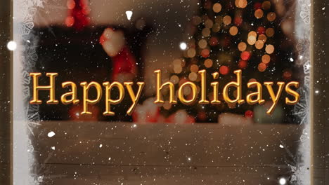 Animation-of-happy-holidays-text-over-snow-falling-with-christmas-decorations