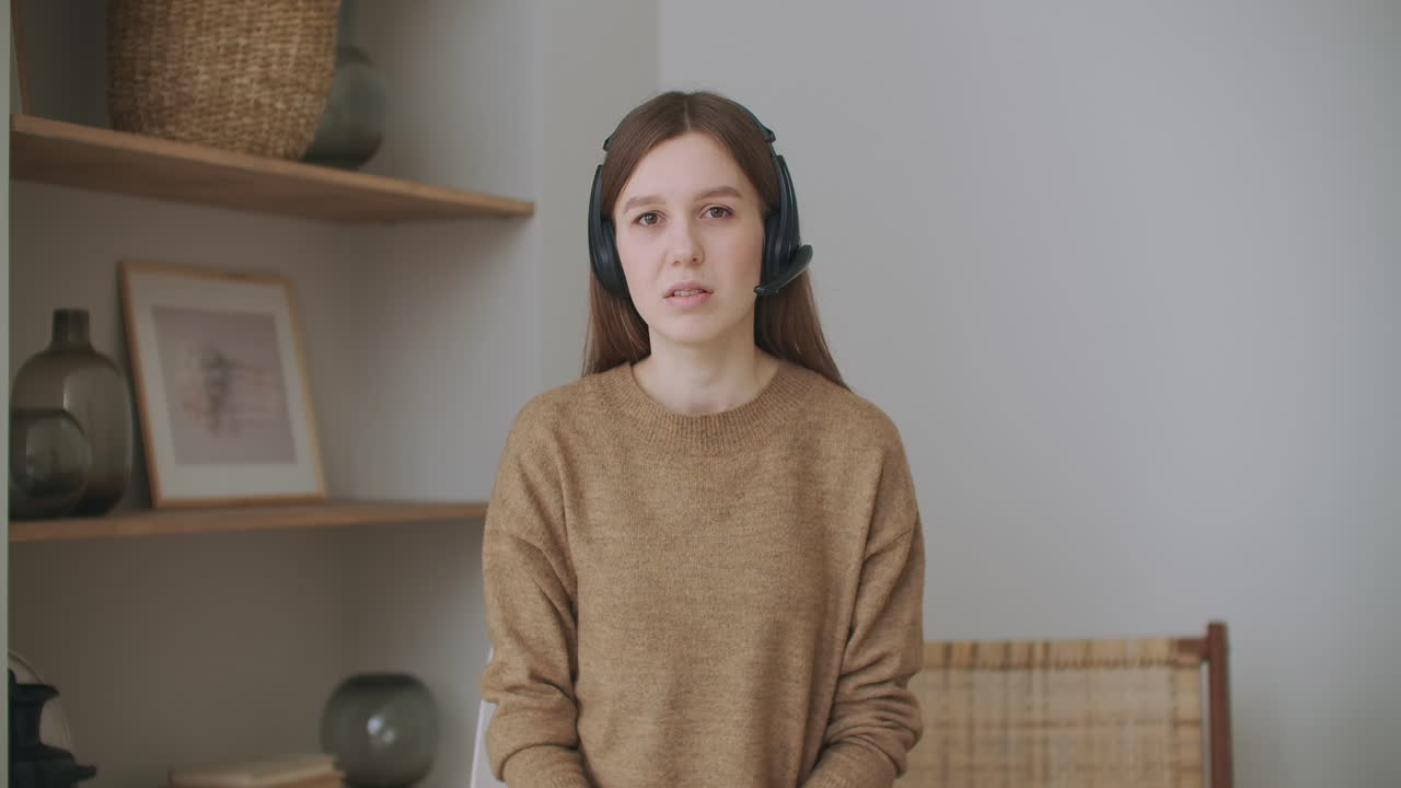 listen webinar lecture or participate one woman conference call with female leader coach mentor speaking during virtual video chat online training webcast