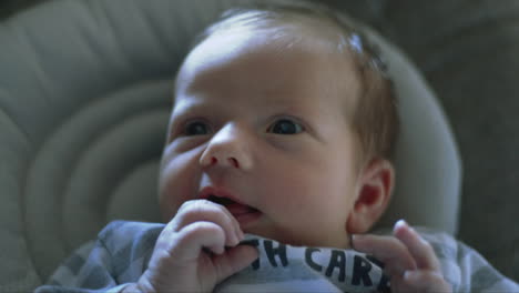 a baby her face while she is looking around