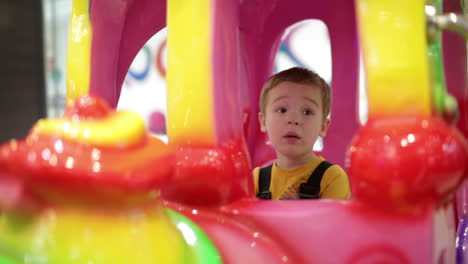 boy in amusement train