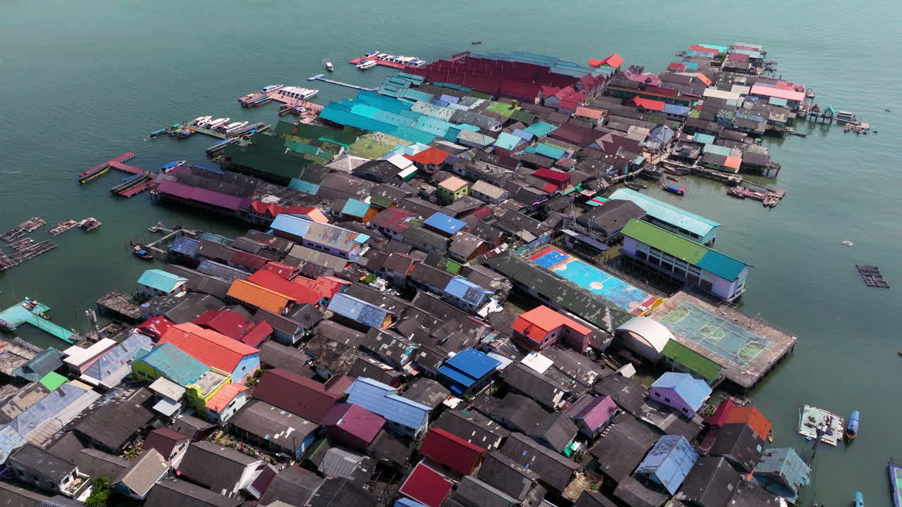 Koh Panyee Floating Village And Blue Sea In Phang Nga Bay, Thailand. - aerial shot