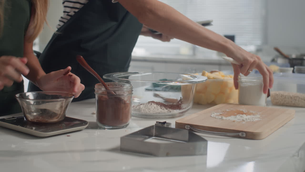 Family Making Dough for Cookies