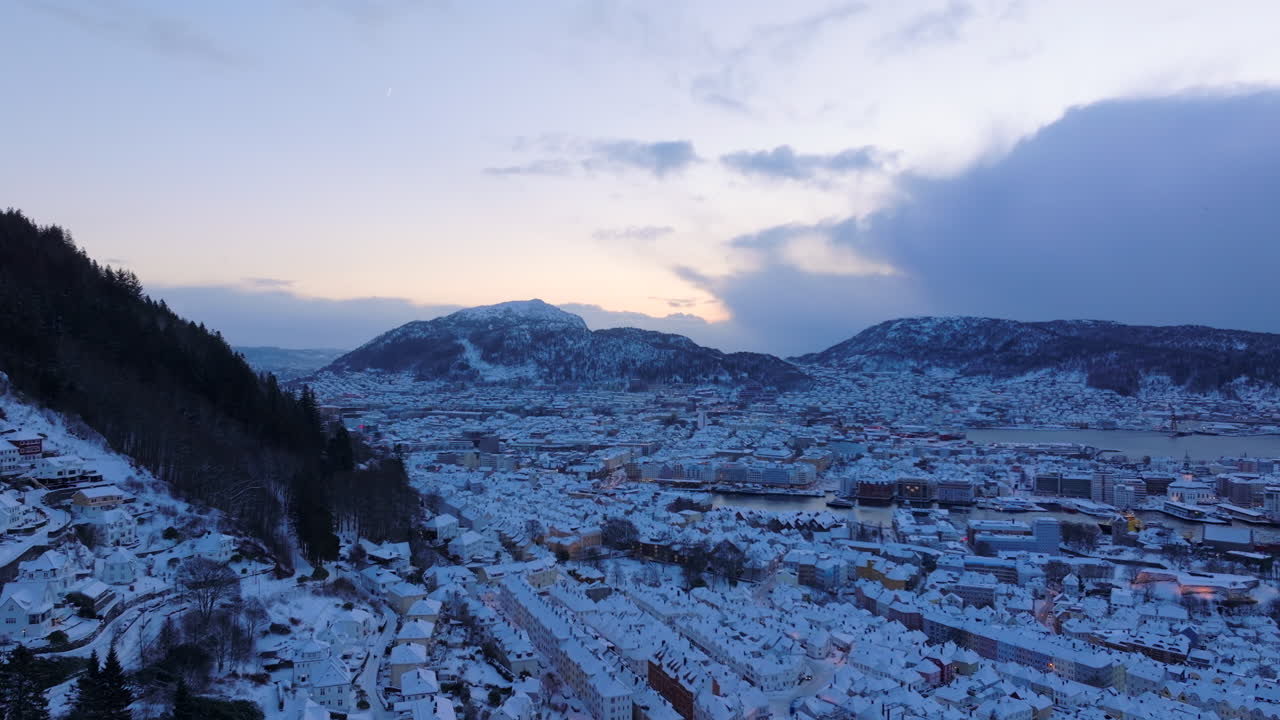 Bergen covered in snow at sunset on a beautiful winter day