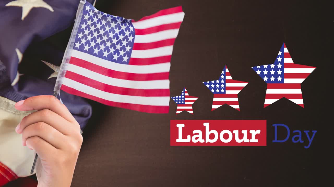 Animation of labour day text over stars and person holding american flag