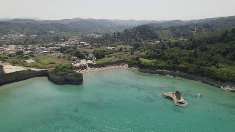 Turquoise-waters-of-Sidari-village-beach,-Corfu,-Greece